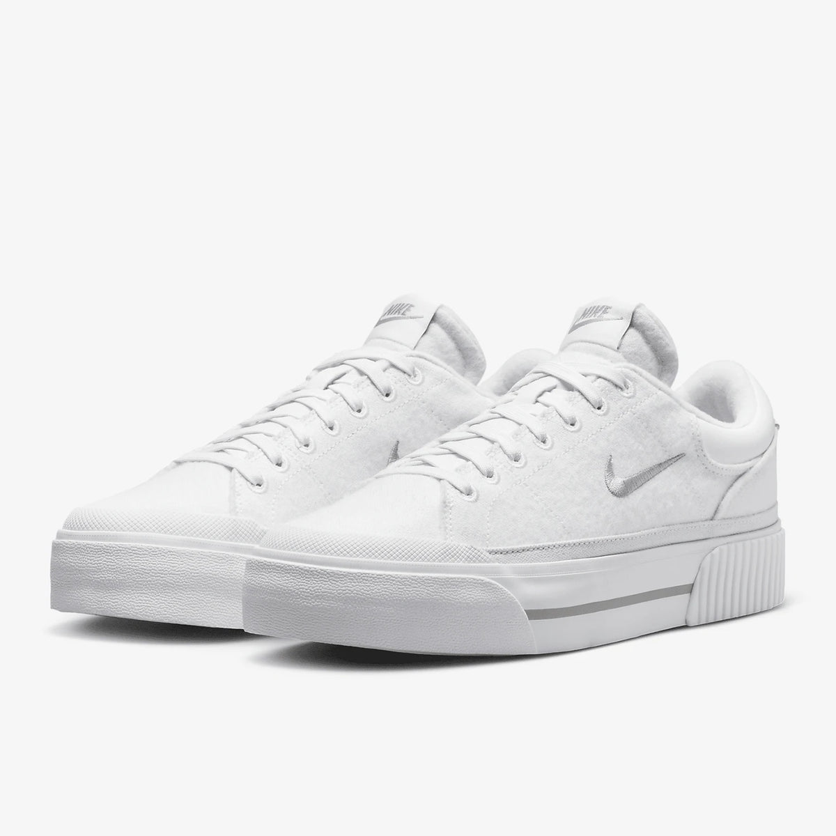 Γυναικεία παπούτσια skate με πλατφόρμα Nike Authentic Legacy Lift FZ2606-100